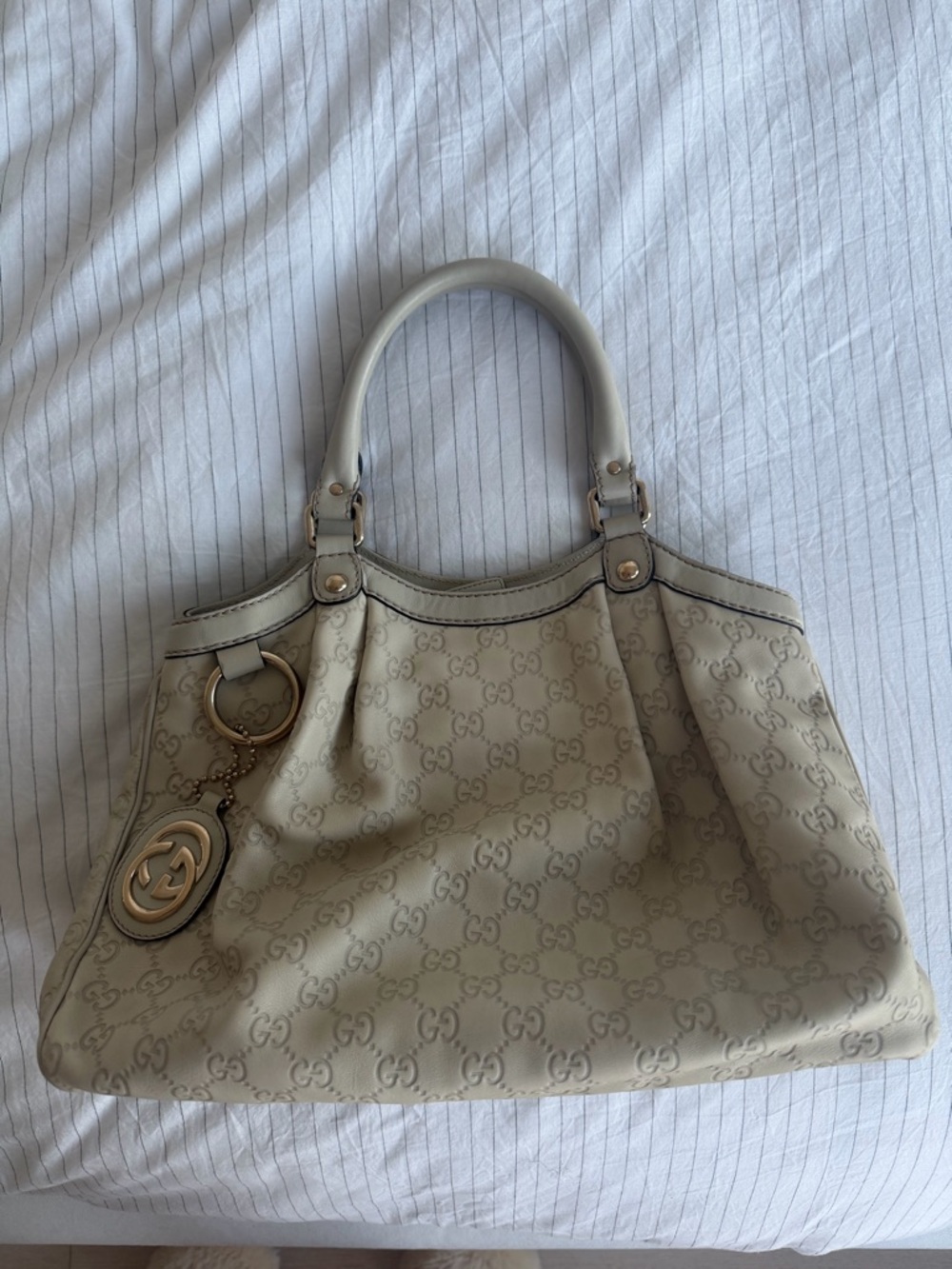 Authentic Gucci Sukey in Off-white Guccissima Leather (Medium)